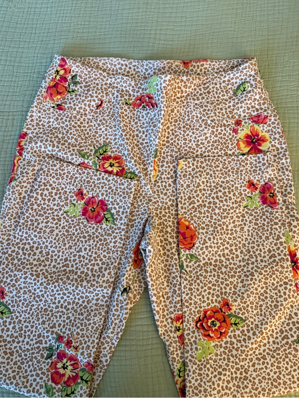 Slimsation by Multiples
Beige Leopard Print pants 
Pink & Orange Floral Accents